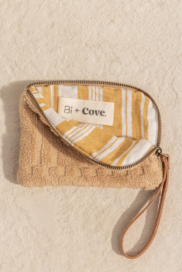 small towel fabric pouch with yellow striped inside