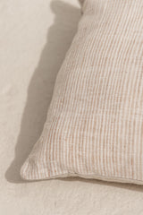 detail of the hand made cushion cover bumi satu. thin beige stripes.