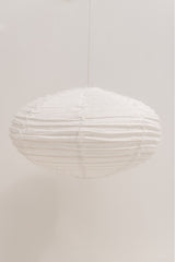 white oval linen shade