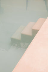 light coloured photograph of minimalistic pool design in bali