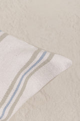 detail of the batu oversize cushion cover with green and blue stripes