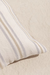 detail of the handmade cushion cover batu with green and blue stripes