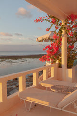 photograph by sheila man of the sunset reflections from a terrace by the ocean