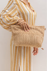 model wearing the towel fabric bag in beige