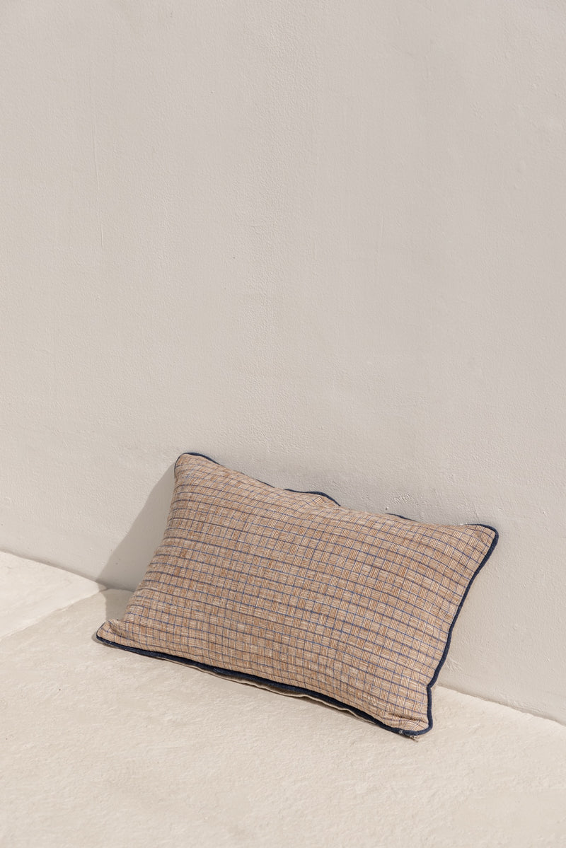 front view on rectangle cushion cover catur, natural colours and handmade in indonesia