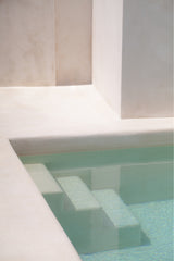 photograph by sheila man of minimalistic white pool stairs in a private bali villa