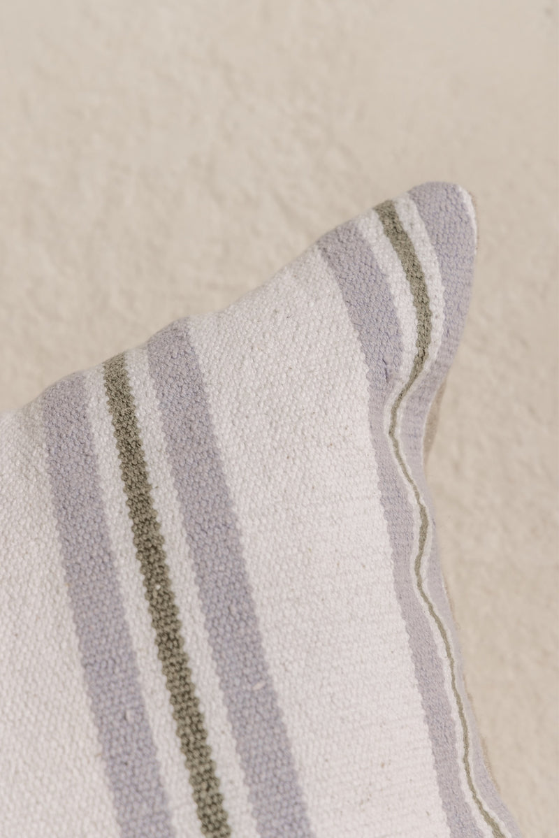 detail of the blue and green striped cushion cover batu