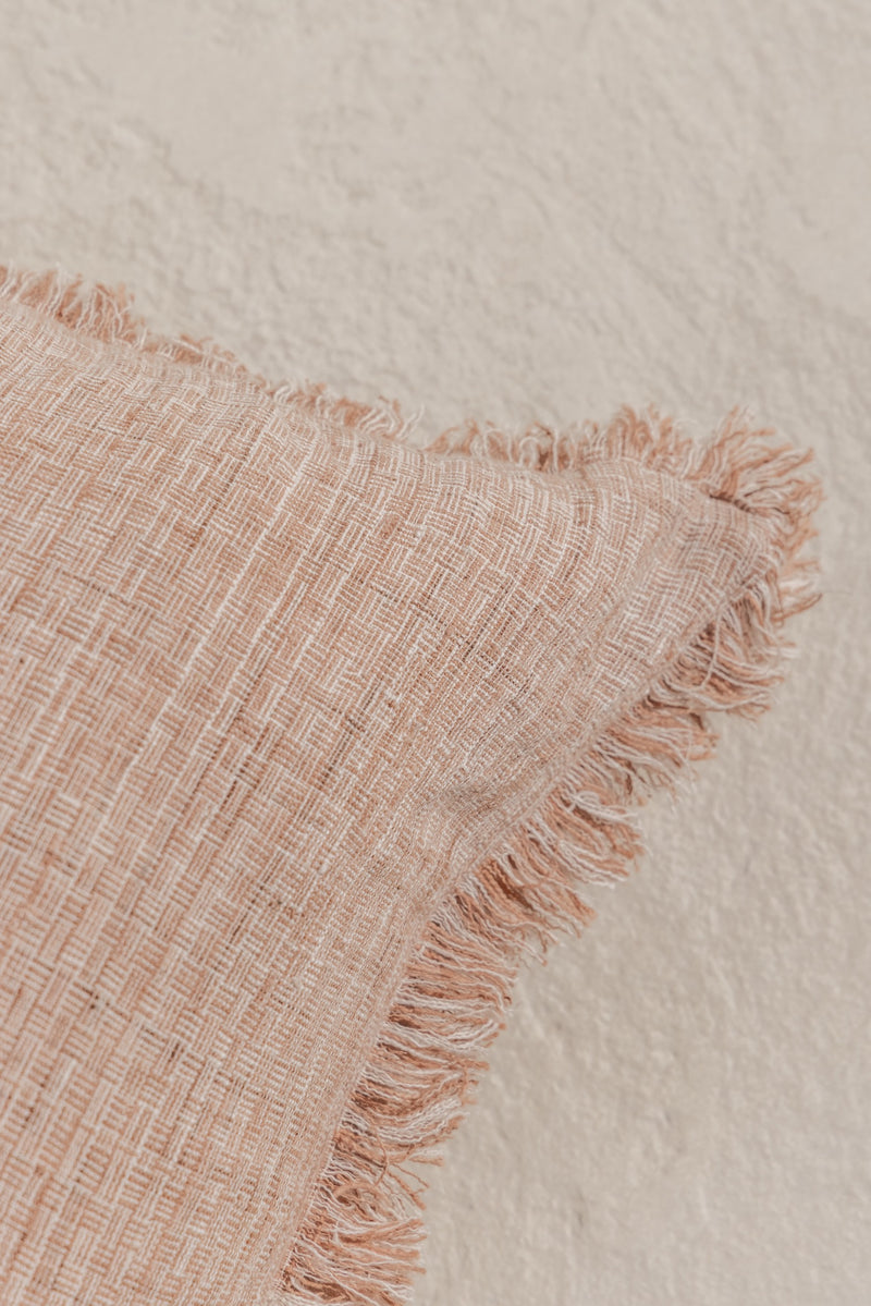 detail view of the desa dua cushion cover with fringes