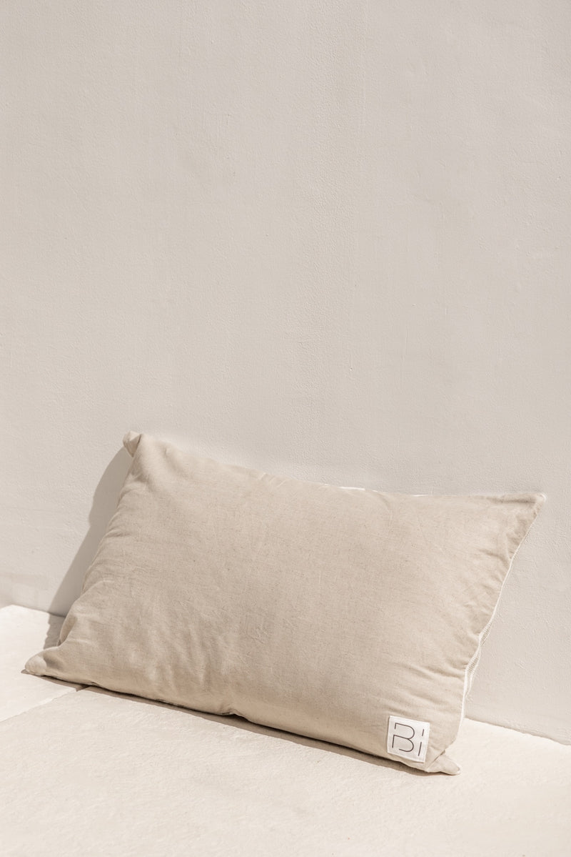 back view of kompass cushion cover in linen