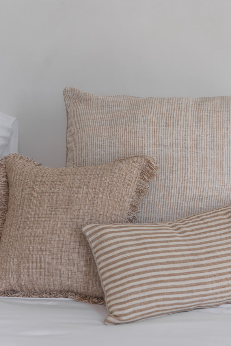 a collection of high quality cushion covers in natural colours. 
