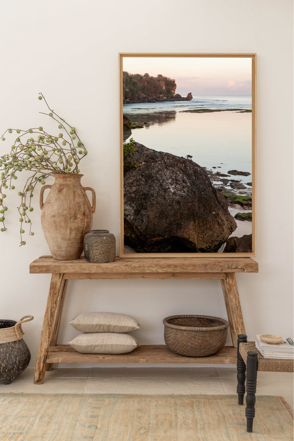 tropical wall decoration, a photograph of rocks and the ocean at sunset time