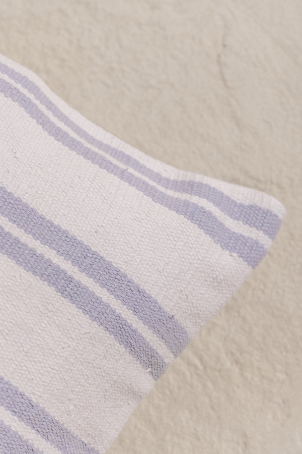 detail of hujan cushion cover with blue stripes